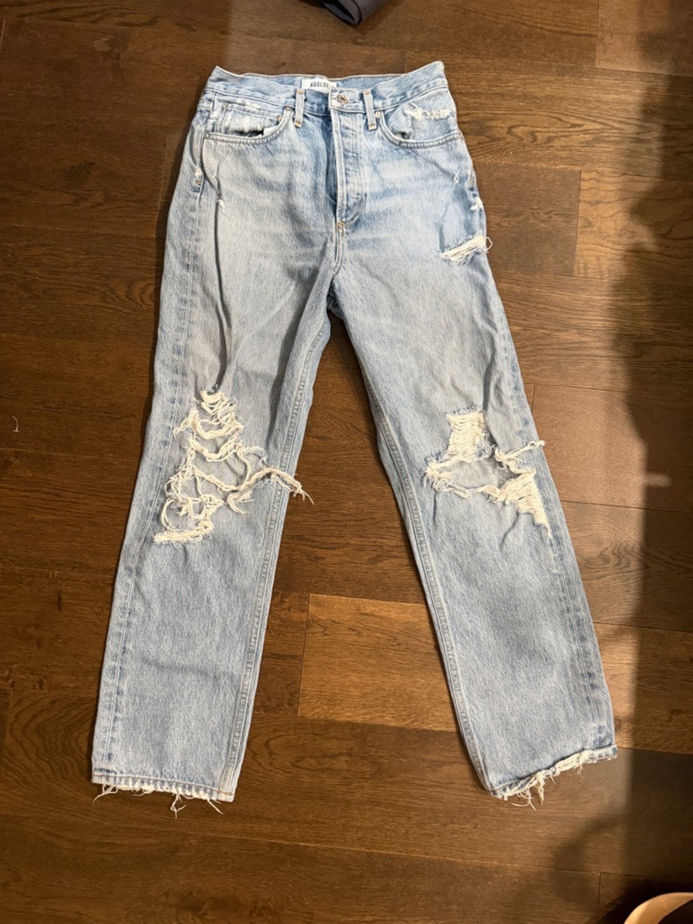 Agolde High-Rise Light Wash Distressed Jeans